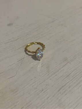 Gold Twist Band Ring with Marquise Clear Stone
